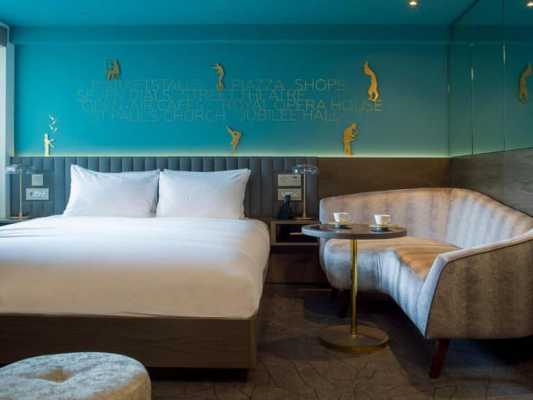 Bedroom with turquoise wall