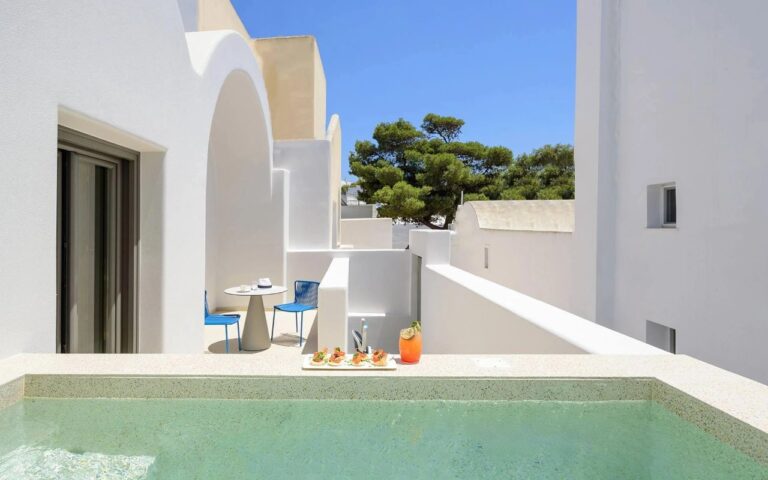 Suite terrace with a private pool and outdoor dining table at Alleys All-Suite Hotel & Spa, Pyrgos, Santorini