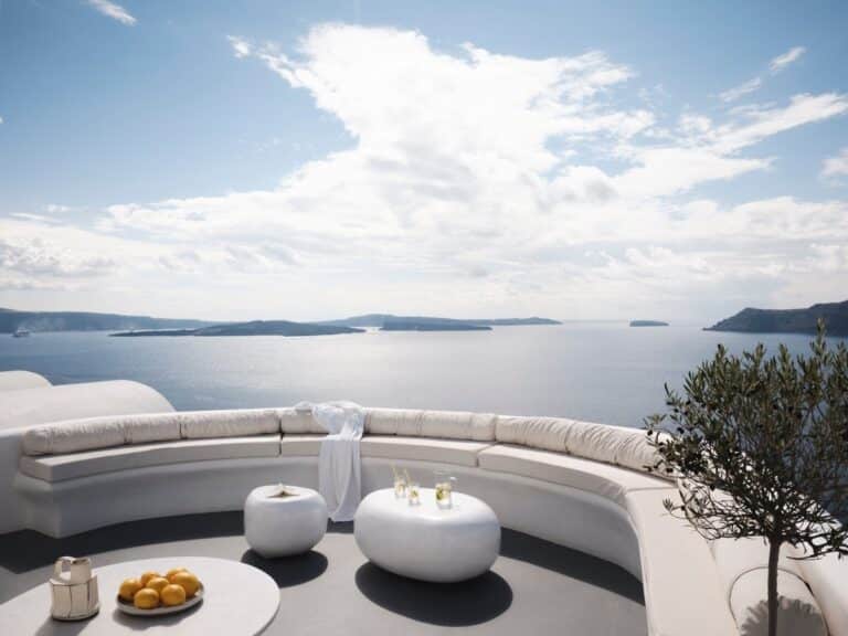 Curved terrace lounge with sea views at Canaves Sunday, Oia, Santorini