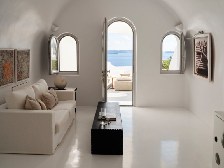 Cave suite living room with arched windows at Canaves Sunday, Oia, Santorini