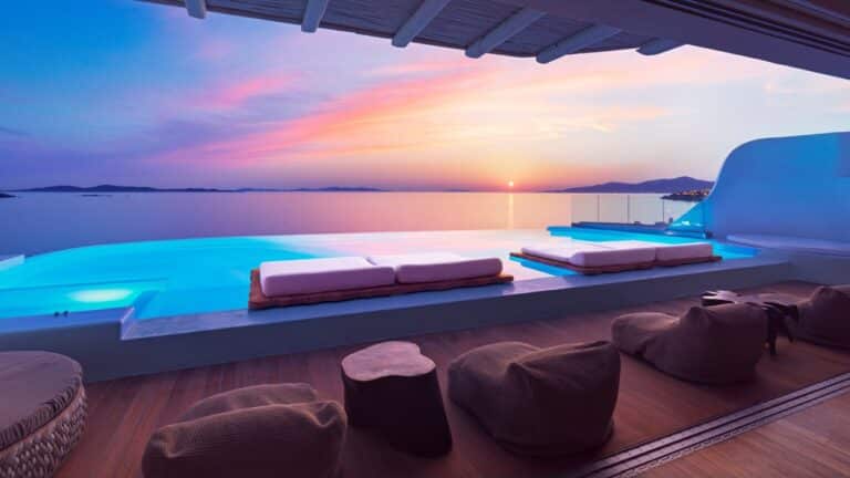 Suite terrace with a private pool at sunset at Cavo Tagoo, Mykonos