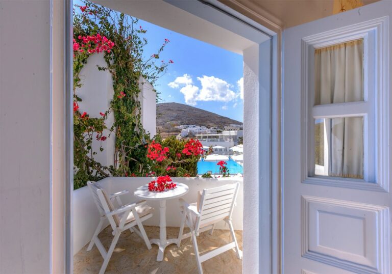 Balcony framed by red bougainvillea at Chora Resort Hotel & Spa, Folegandros