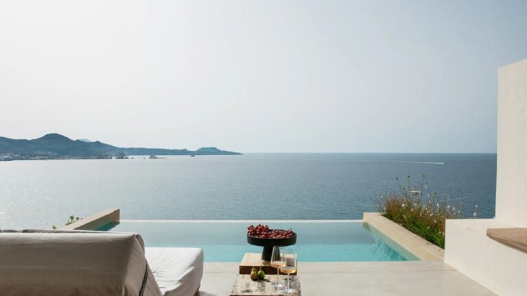 Private infinity pool on a suite terrace facing the sea at Domes White Coast, Mytakas, Milos